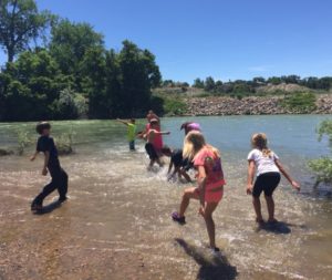 NRCP camp kids in river